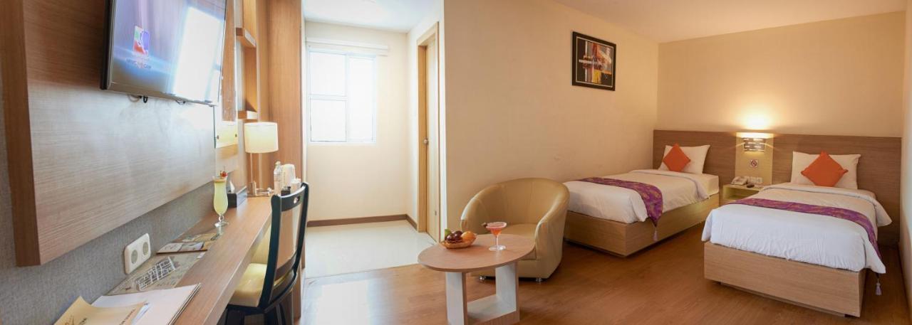 Winstar Hotel Пеканбару Экстерьер фото